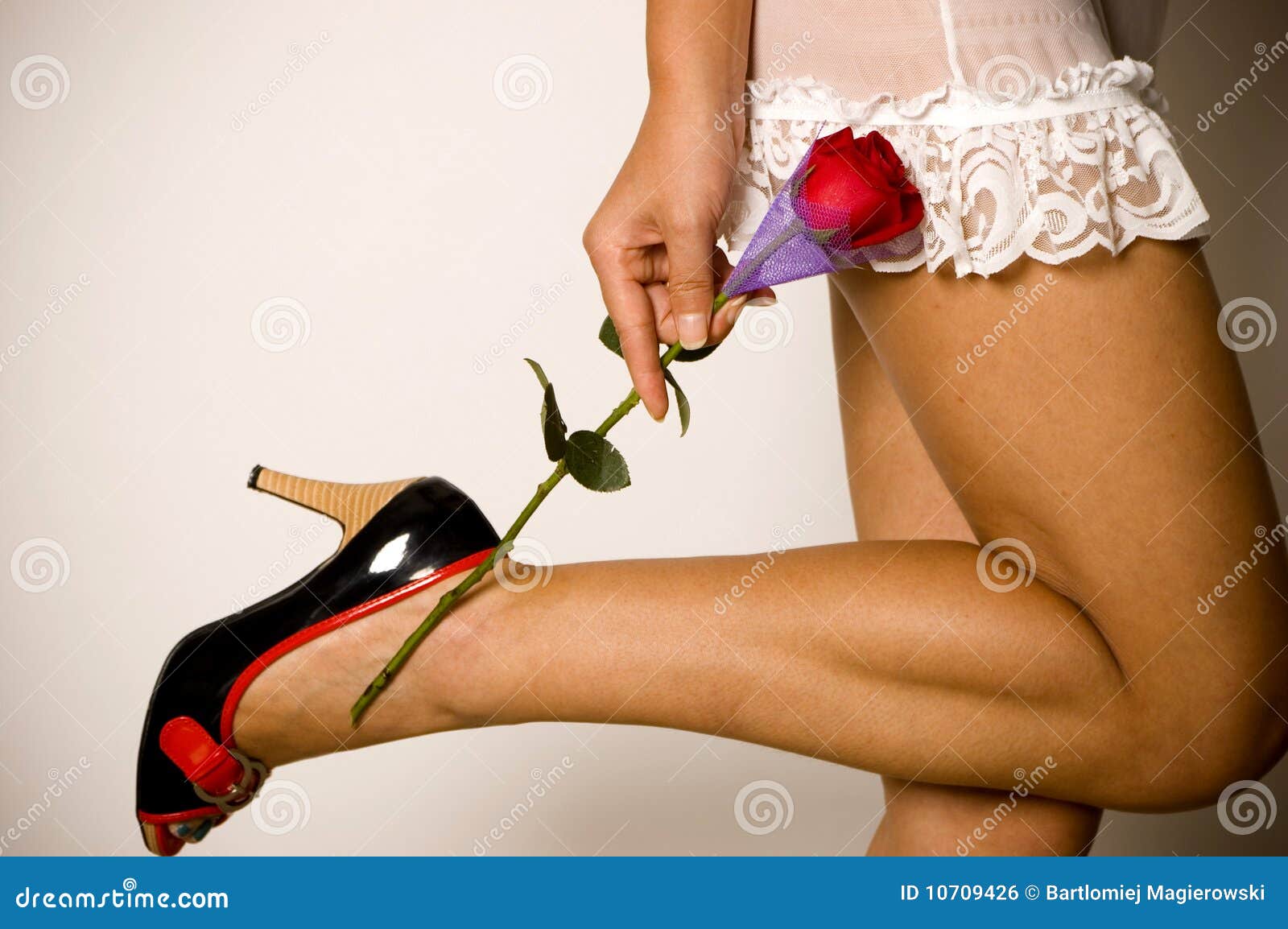 Постер Girl in sexy lingerie holding rose, плакат.