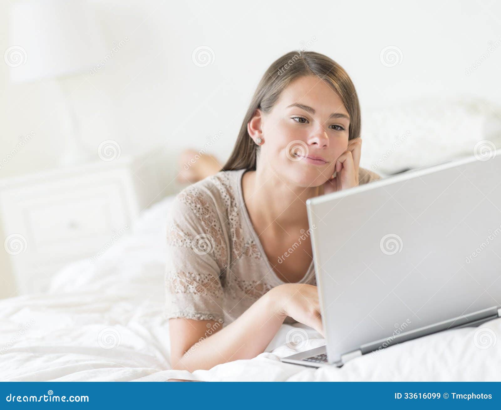 Girl Smiling While Using Laptop In Bed Royalty Free Stock Images Image 33616099