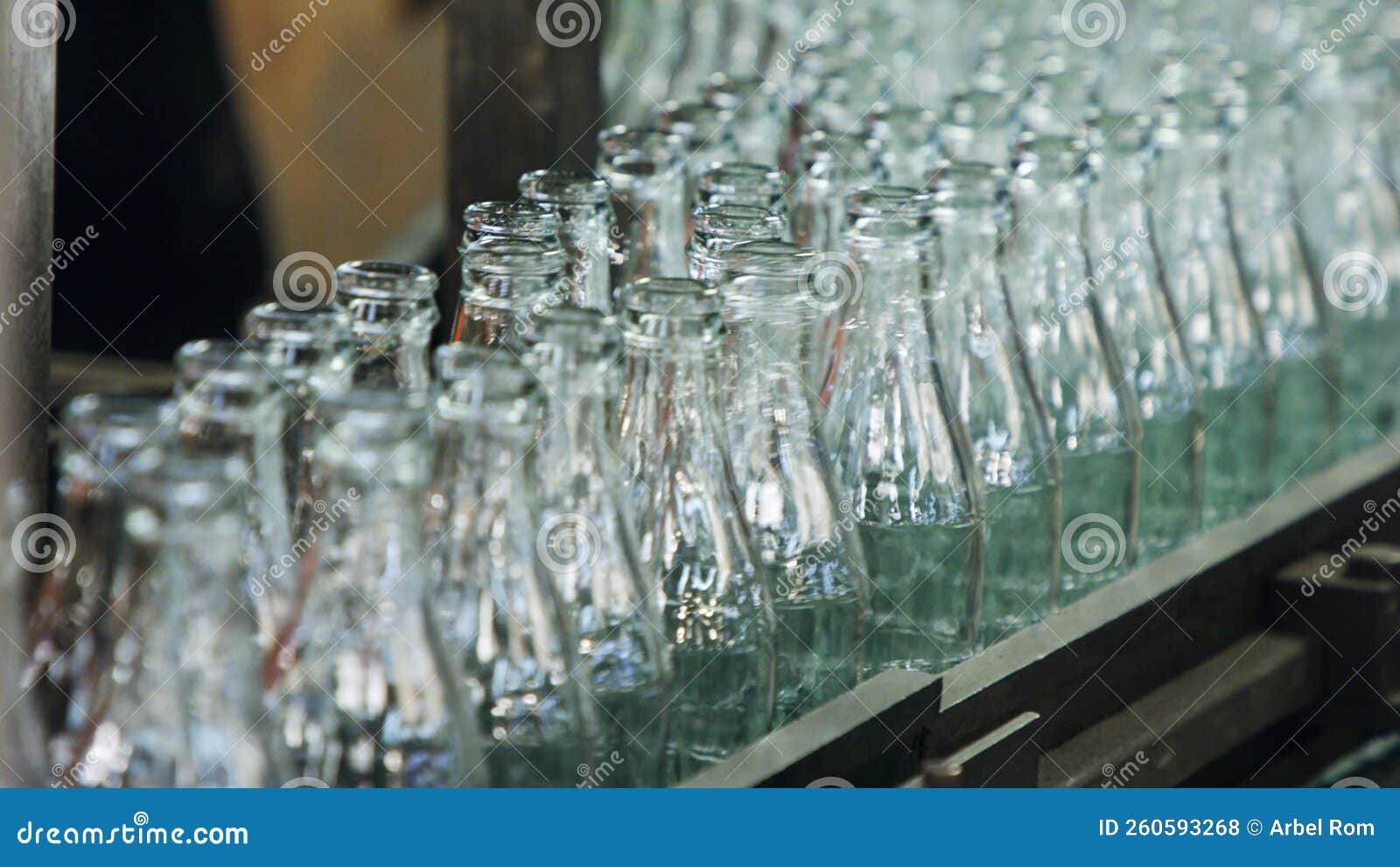 Glass Bottles Production Glass Bottles On A Conveyor Belt In An