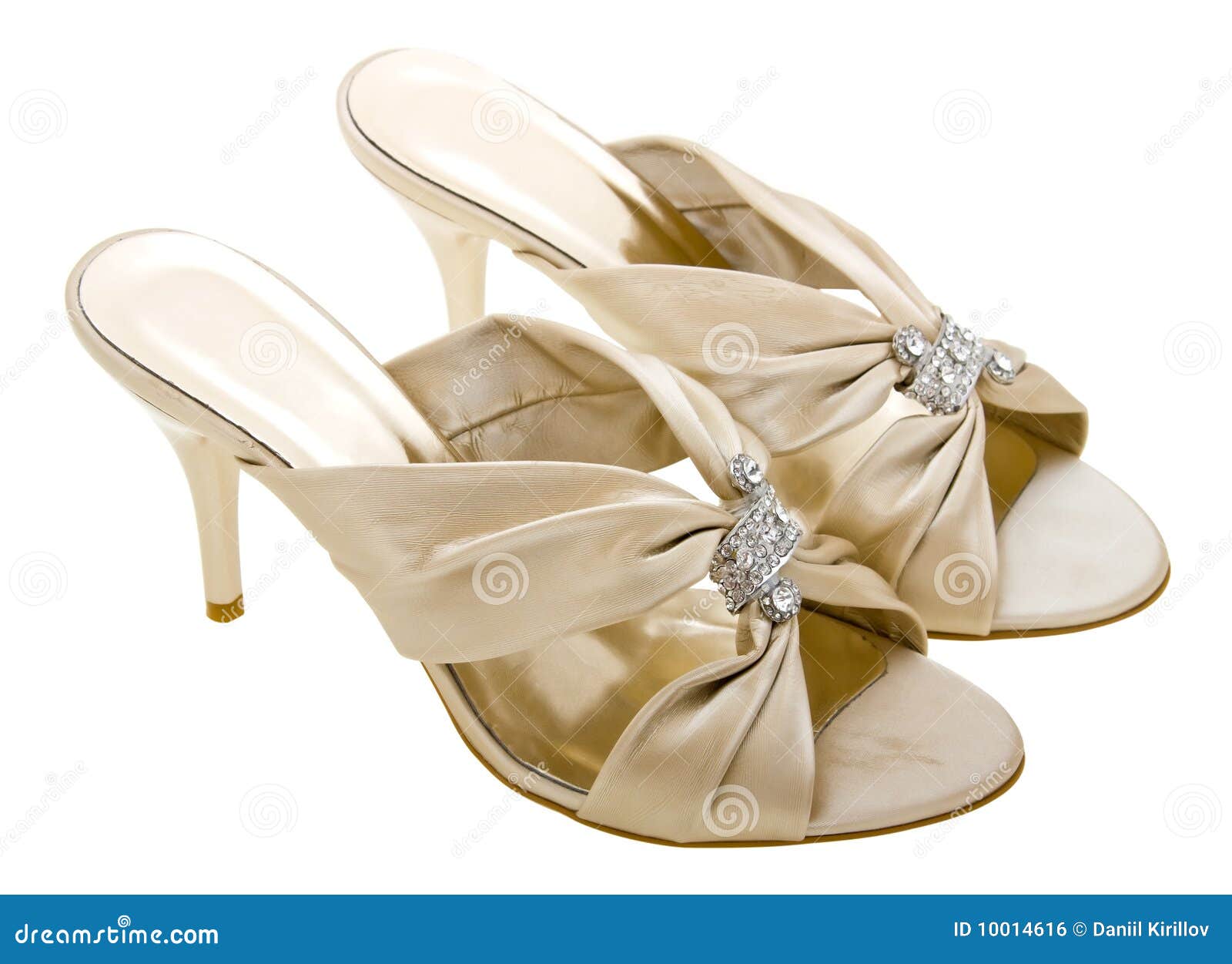 Gold women shoes isolated on white background.