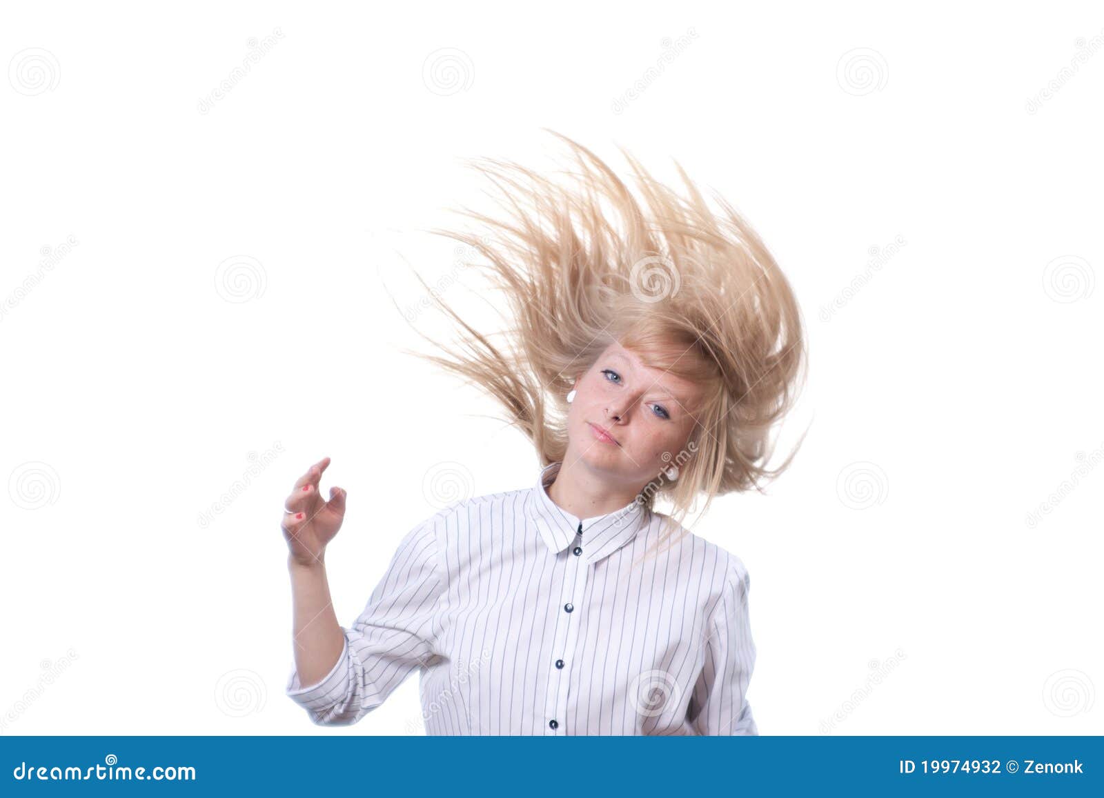 Golden hair young woman on white background with flying hair.