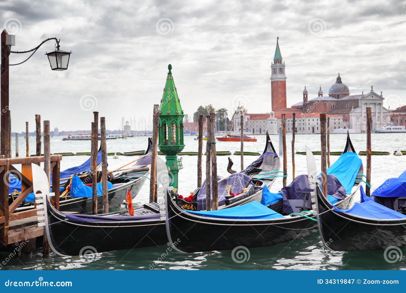  - gondolas-near-saint-mark-square-san-giorgio-di-maggiore-church-background-venice-italy-34319847