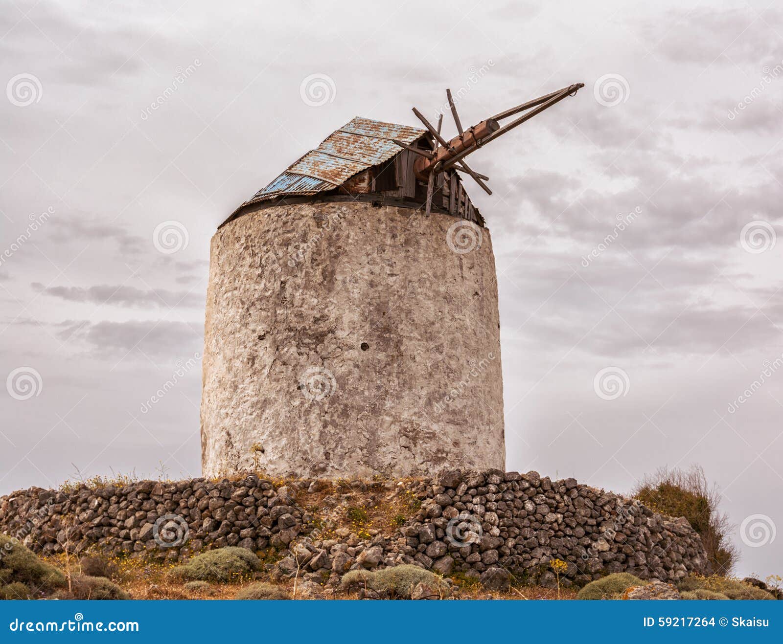 Greek Style Old Windmill In Kimolos Island, Cyclades Stock Photo 