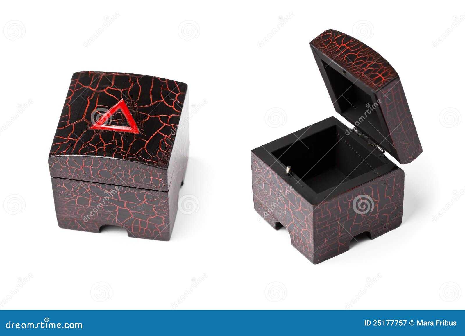 Handmade little black and red wooden boxes, opened and closed, on 