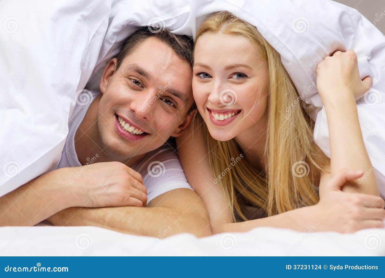 http://thumbs.dreamstime.com/z/happy-couple-sleeping-bed-hotel-travel-relationships-happiness-concept-37231124.jpg