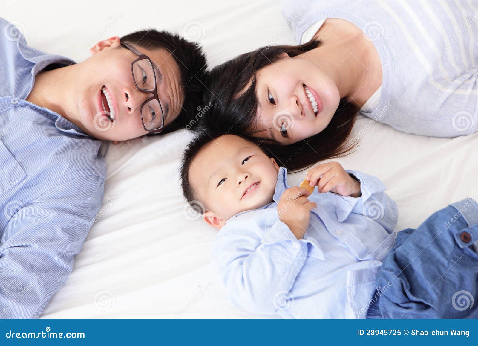 Happy Family With His In Bed Happy Family With Children In Bed Royalty Free Stock Photo