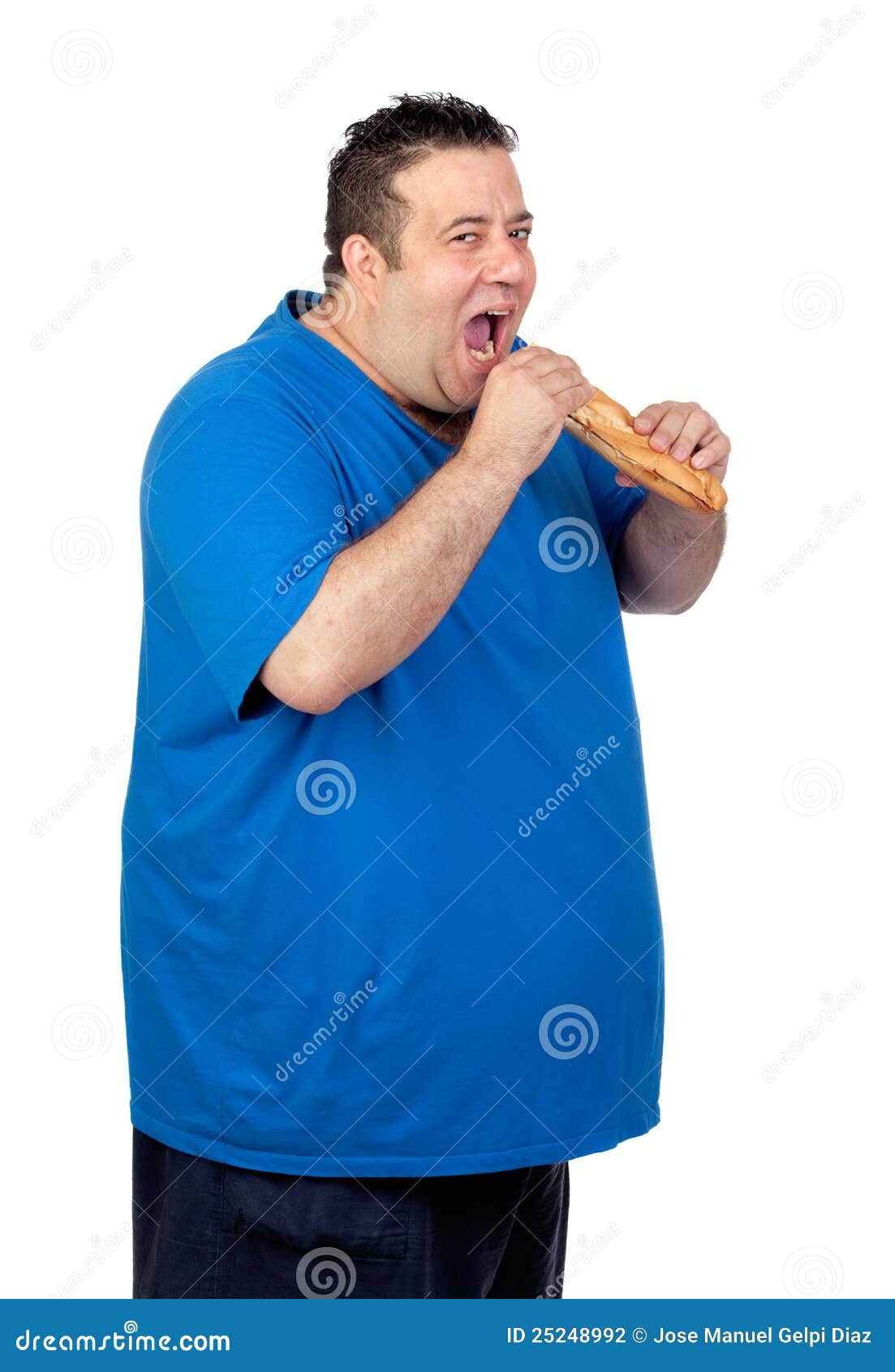 happy-fat-man-eating-large-bread-2524899