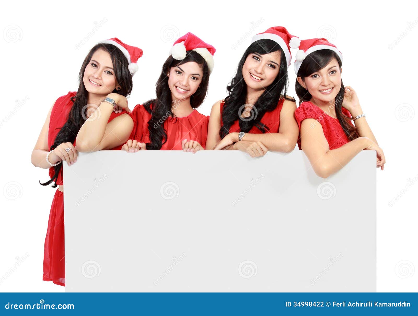 Stock Photography: Happy funny people with christmas santa hat holding ...