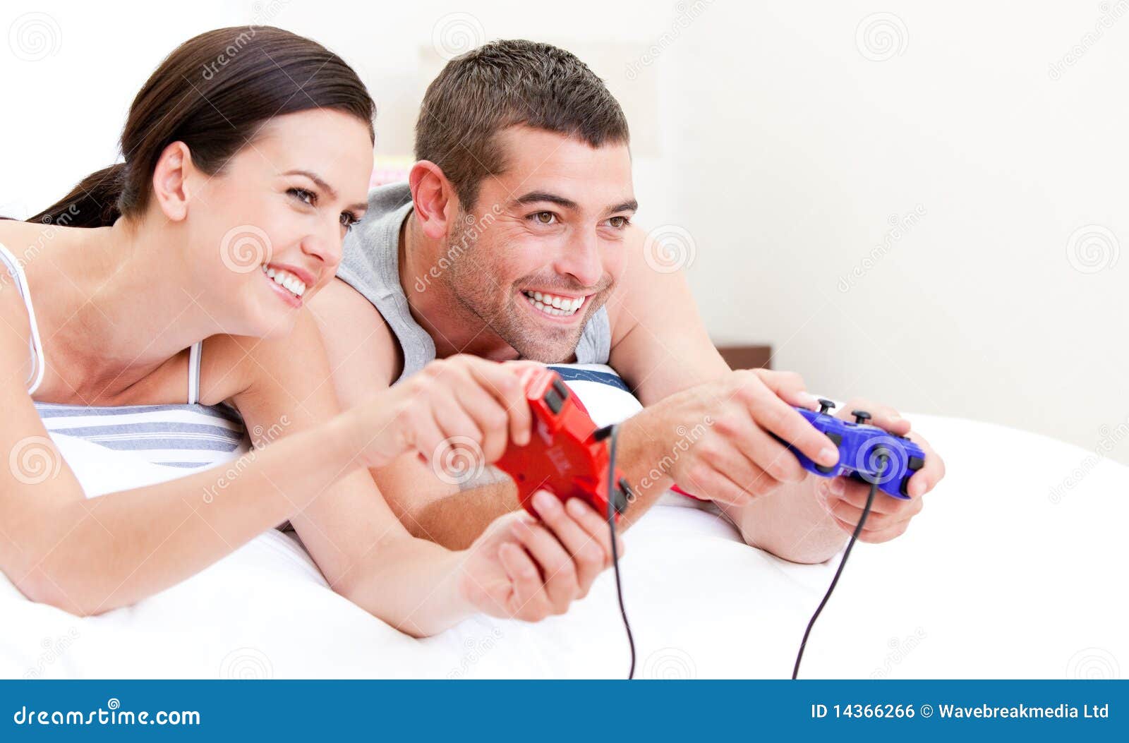 Happy Husband And Wife Playing Videogames In Bed Royalty 58800 Hot Sex Picture picture