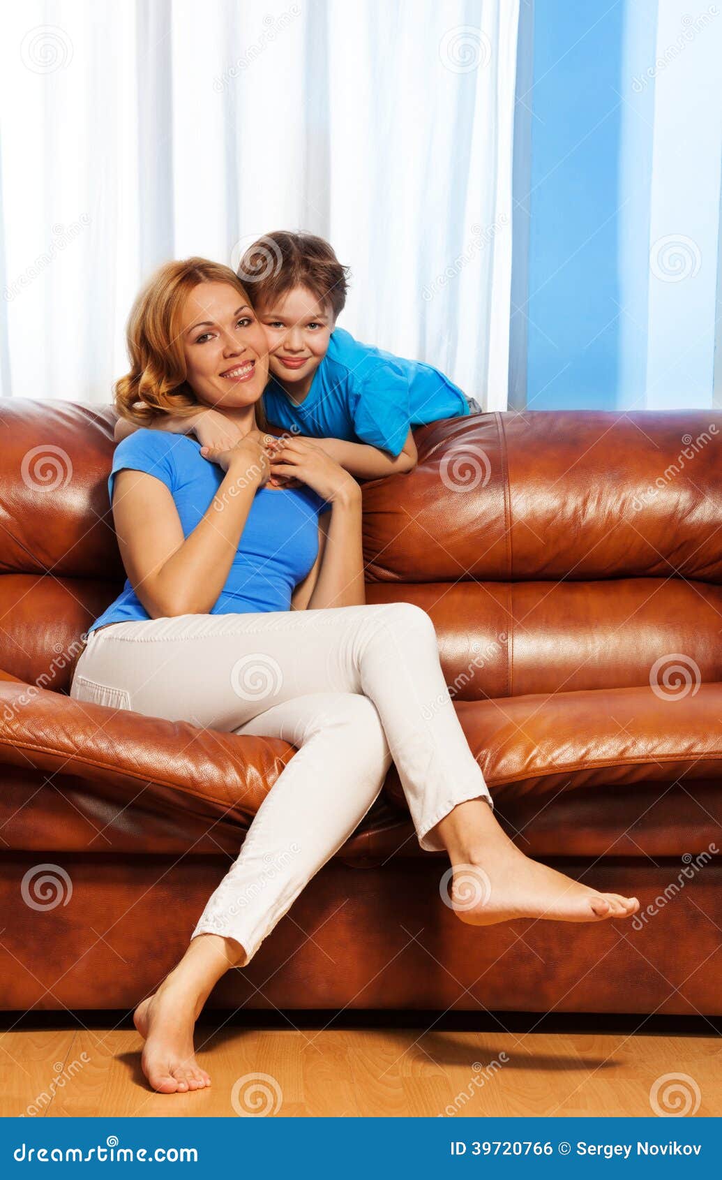 Happy Mother And Son Portrait At Home Stock Photo Image Of Couch