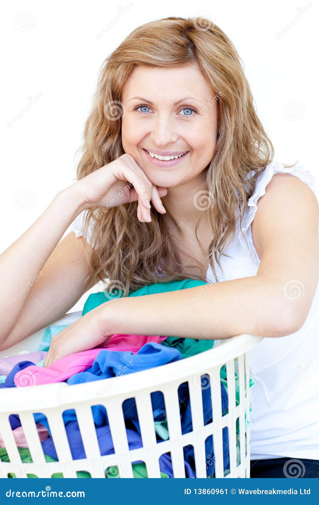 happy-woman-doing-laundry-13860961.jpg