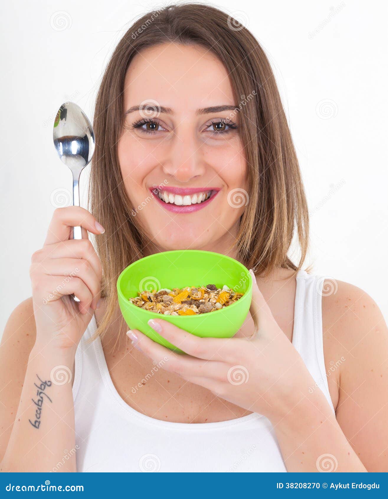 healthy-woman-eating-cereal-38208270.jpg