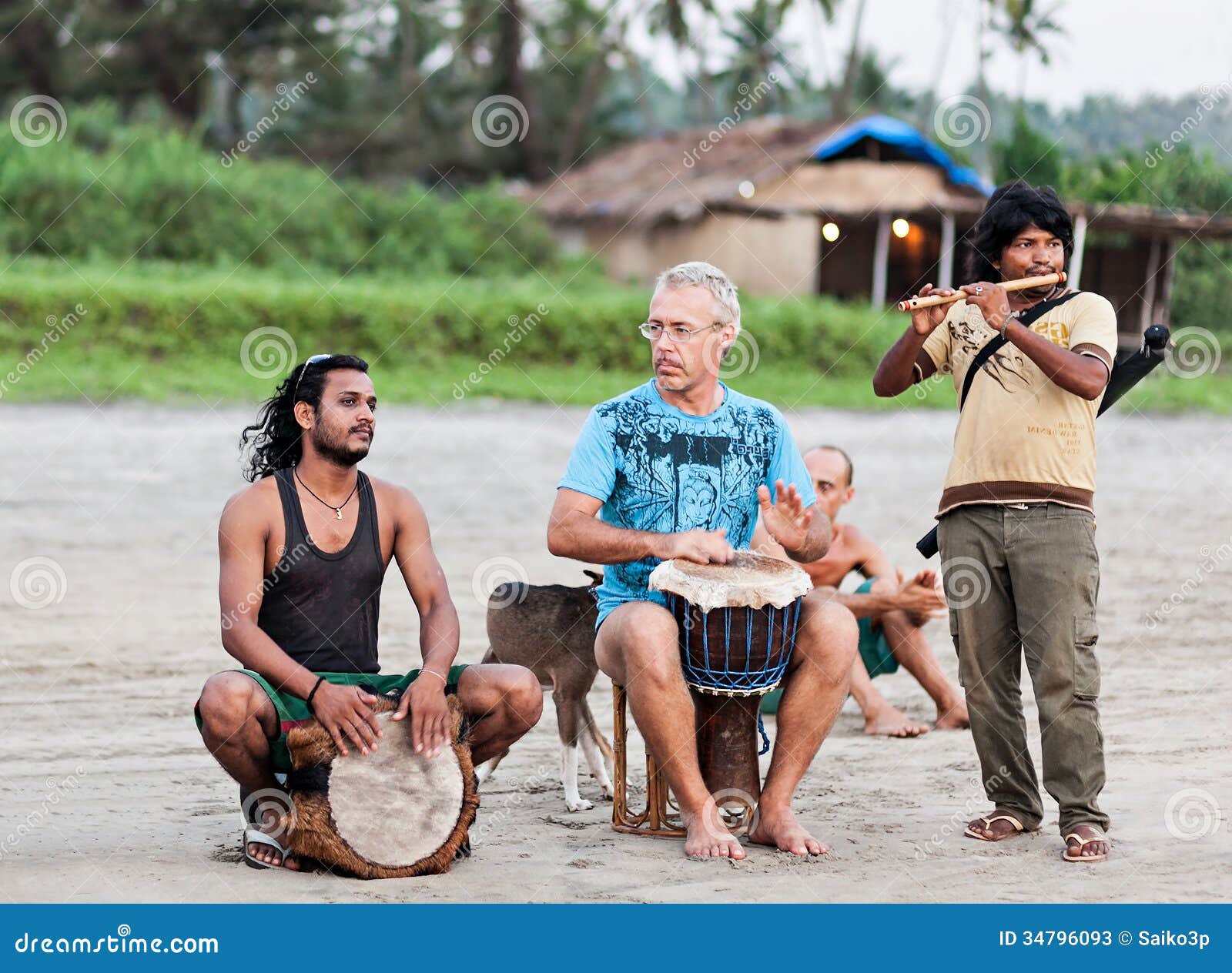 Goa+People ... Goa, India. At the Arambol beach people often sit and enjoy the