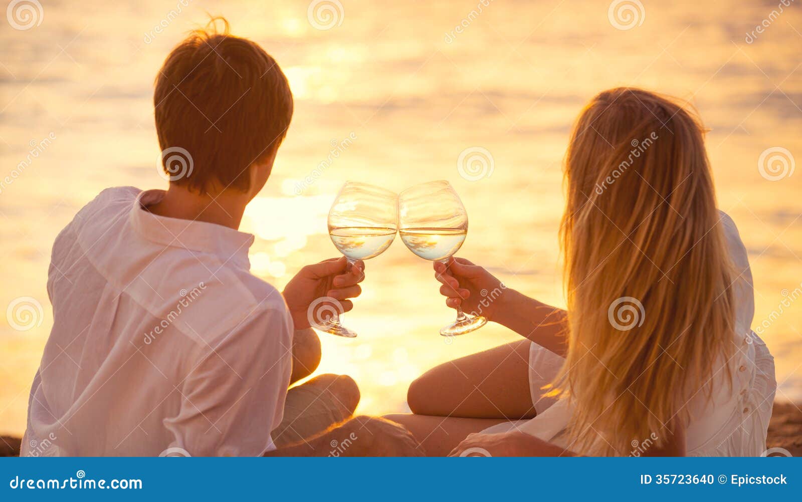 http://thumbs.dreamstime.com/z/honeymoon-concept-man-woman-love-couple-enjoying-glass-champagne-tropical-beach-sunset-beautiful-sunset-light-35723640.jpg