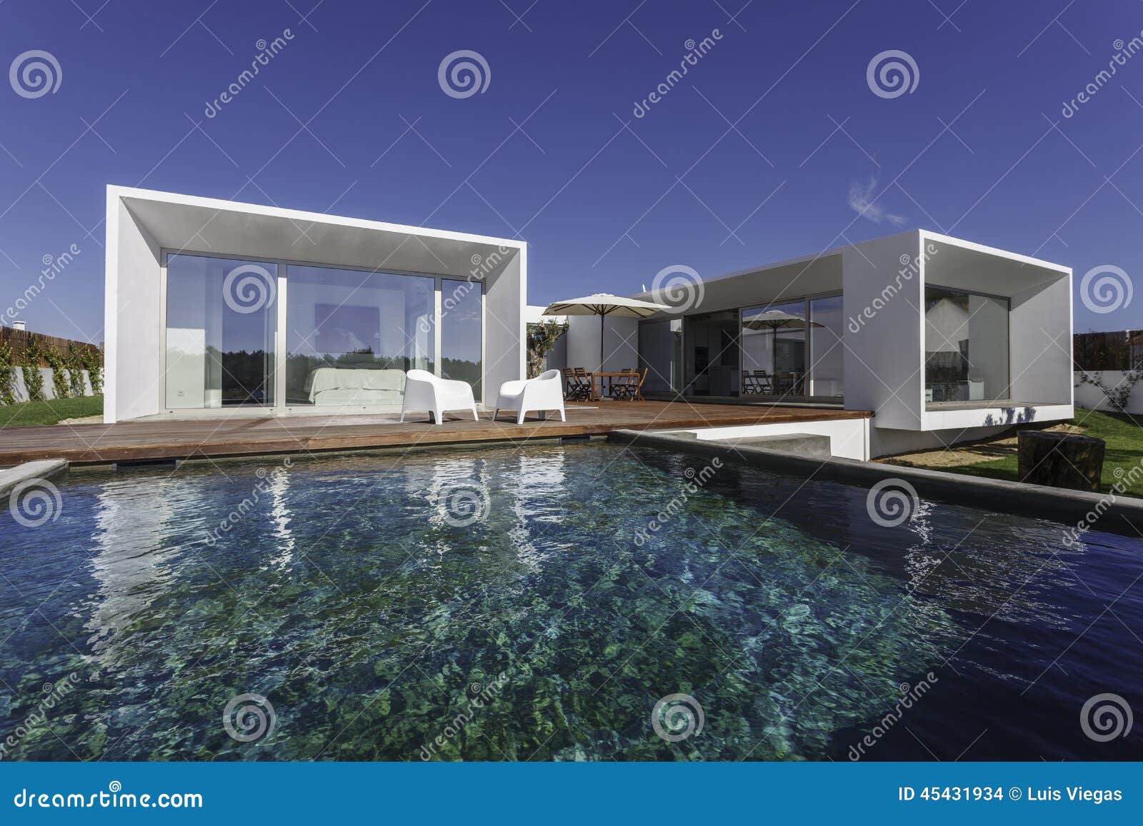 House With Garden Swimming Pool And Wooden Deck Stock Photo - Image
