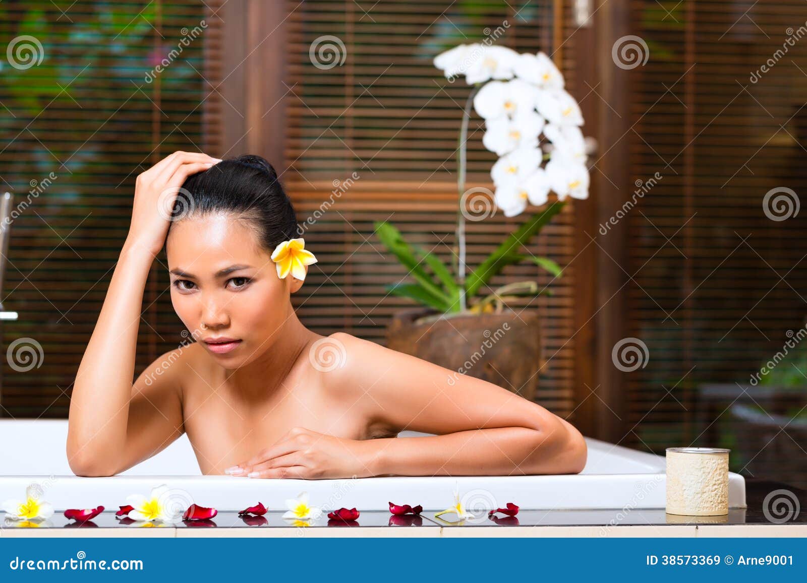 Indonesian Woman Having Wellness Bath In Spa Royalty Free