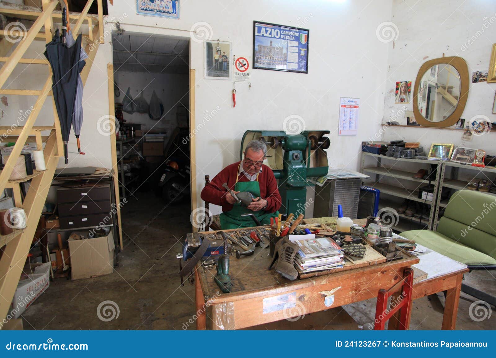 Italian shoemaker at work in Vignanello medieval town. Vignanello is a ...