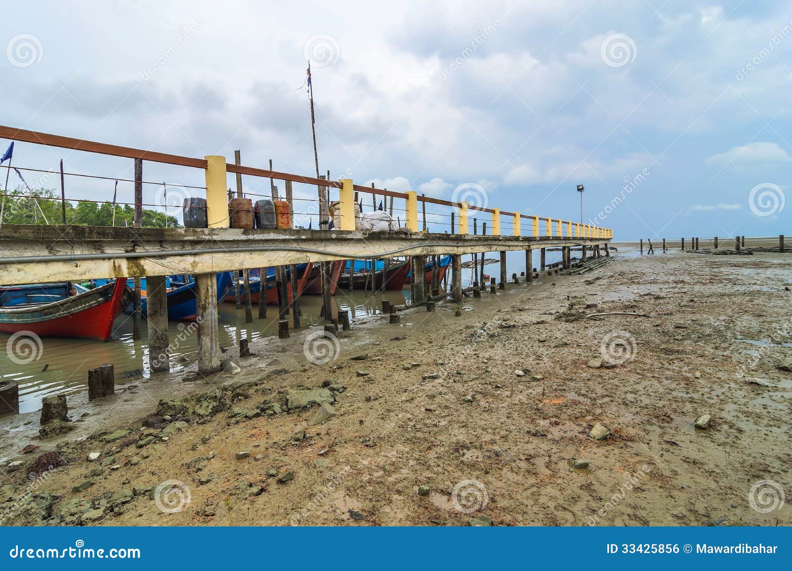 Royalty Free Stock Image: Jetty and traditional wooden boat