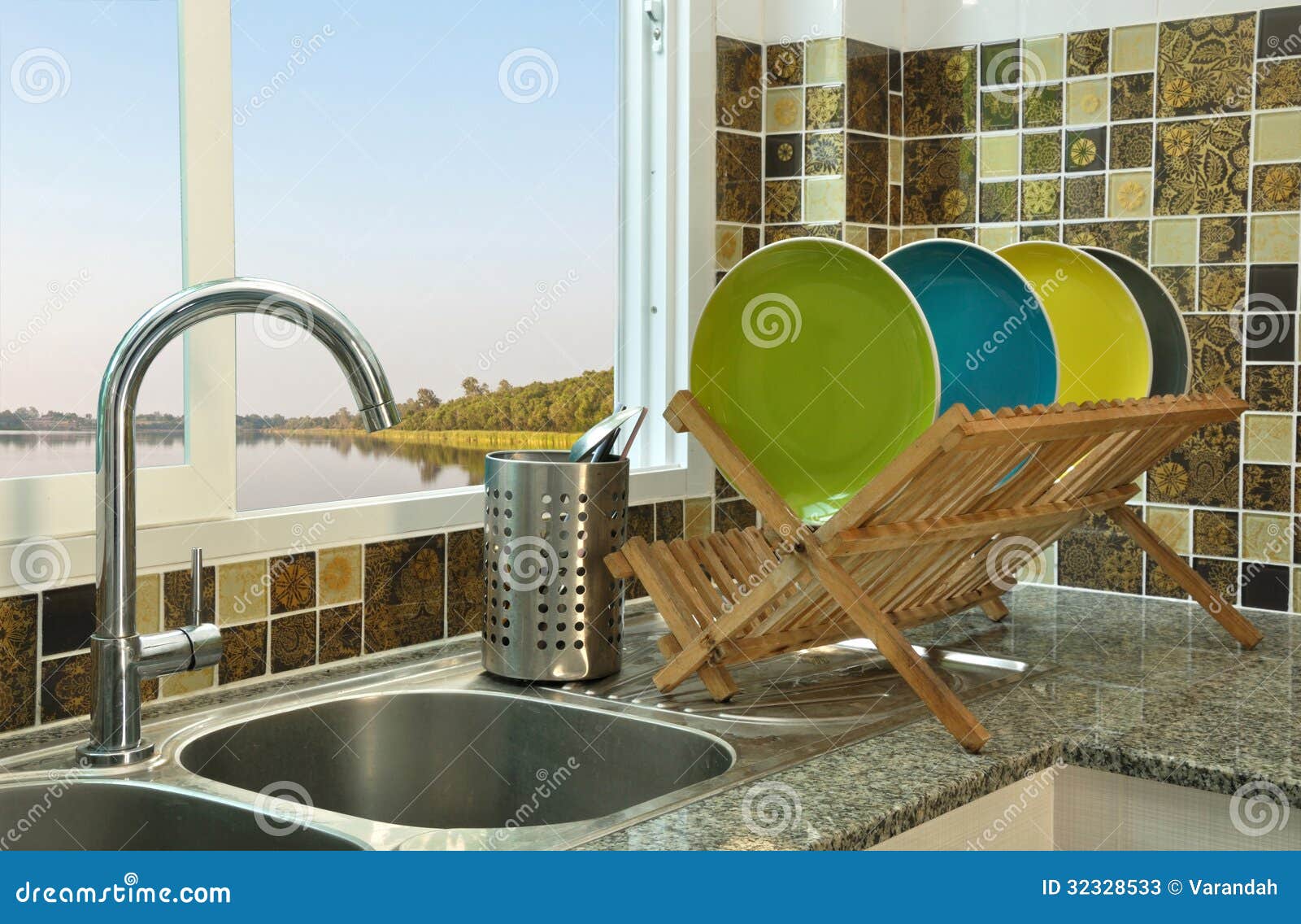 Kitchen sink with wooden plate rack in asian kitchen style.
