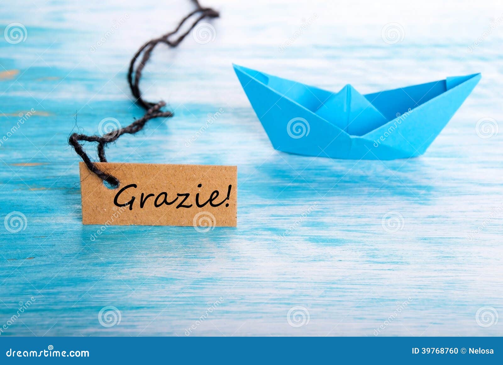 Label with the Italian Word Grazie which means Thanks and a Boat.