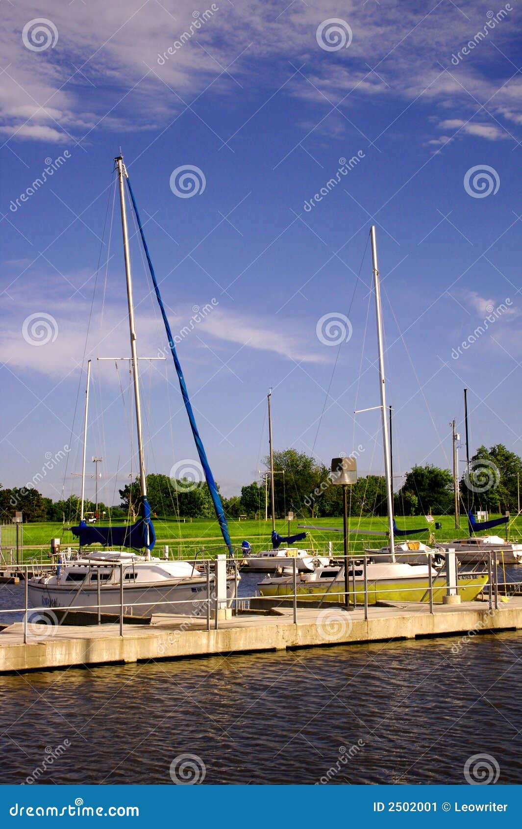 Sailboats at Lake Hefner in Oklahoma City docked at harbor.