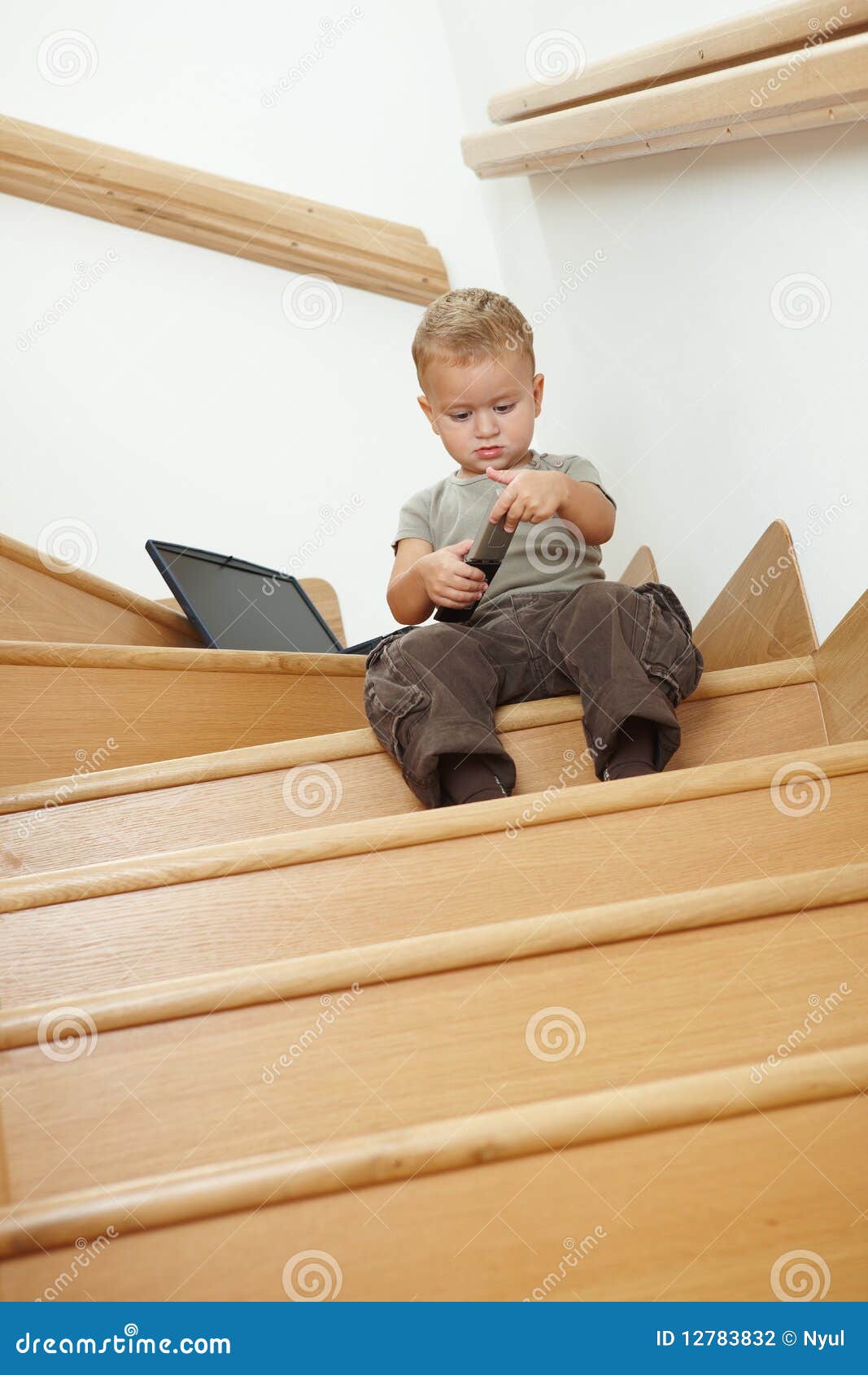 Little Boy Sitting On Stairs Stock Photography - Image: 12783832