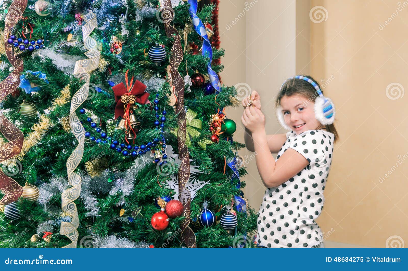 little pretty happy girl decorating and preparing a little pretty happy girl decorating and preparing a