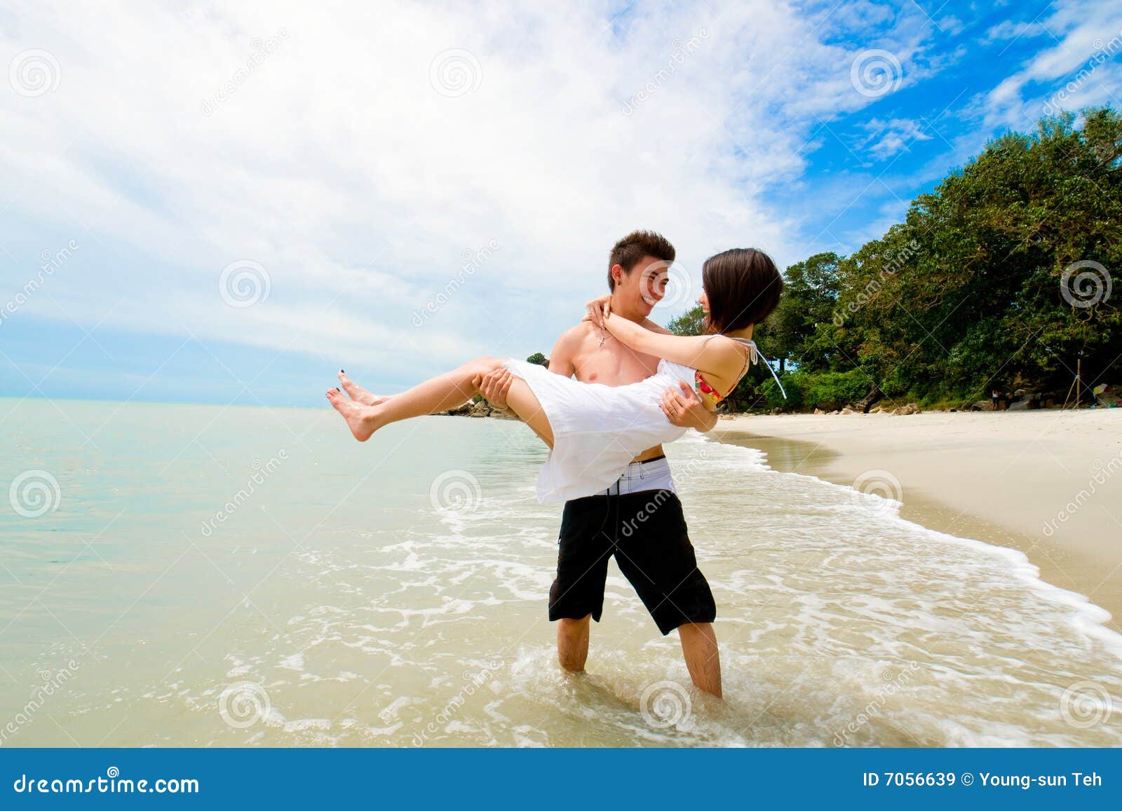 http://thumbs.dreamstime.com/z/loving-happy-couple-beach-7056639.jpg