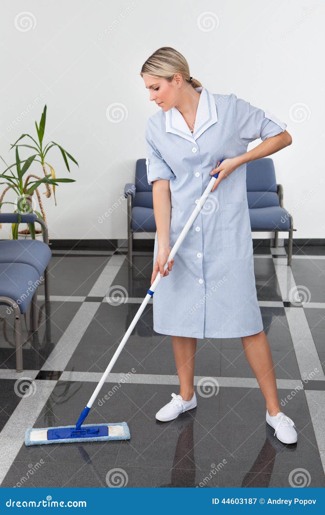 Maid Cleaning The Floor Stock Photo - Image: 44603187