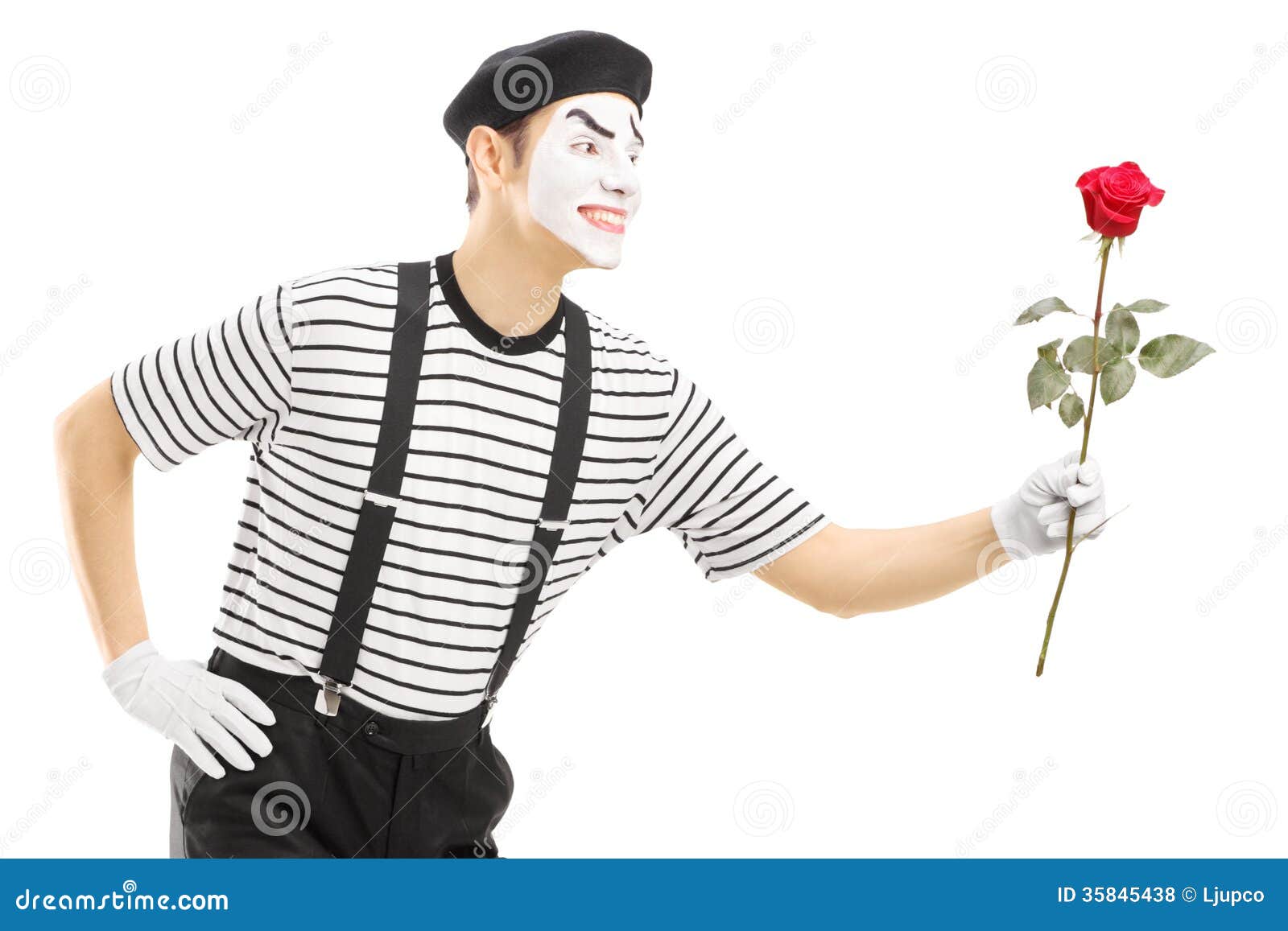 Male Mime Artist Giving A Rose Flower Royalty Free Stock Photos 