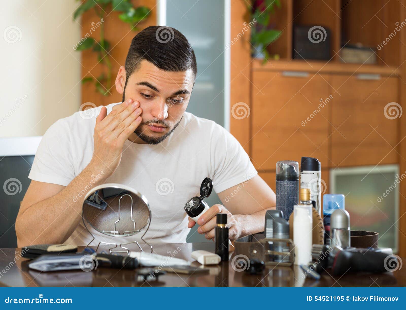 Man Applying Cream On Face Skin Stock Photo Image 54521195