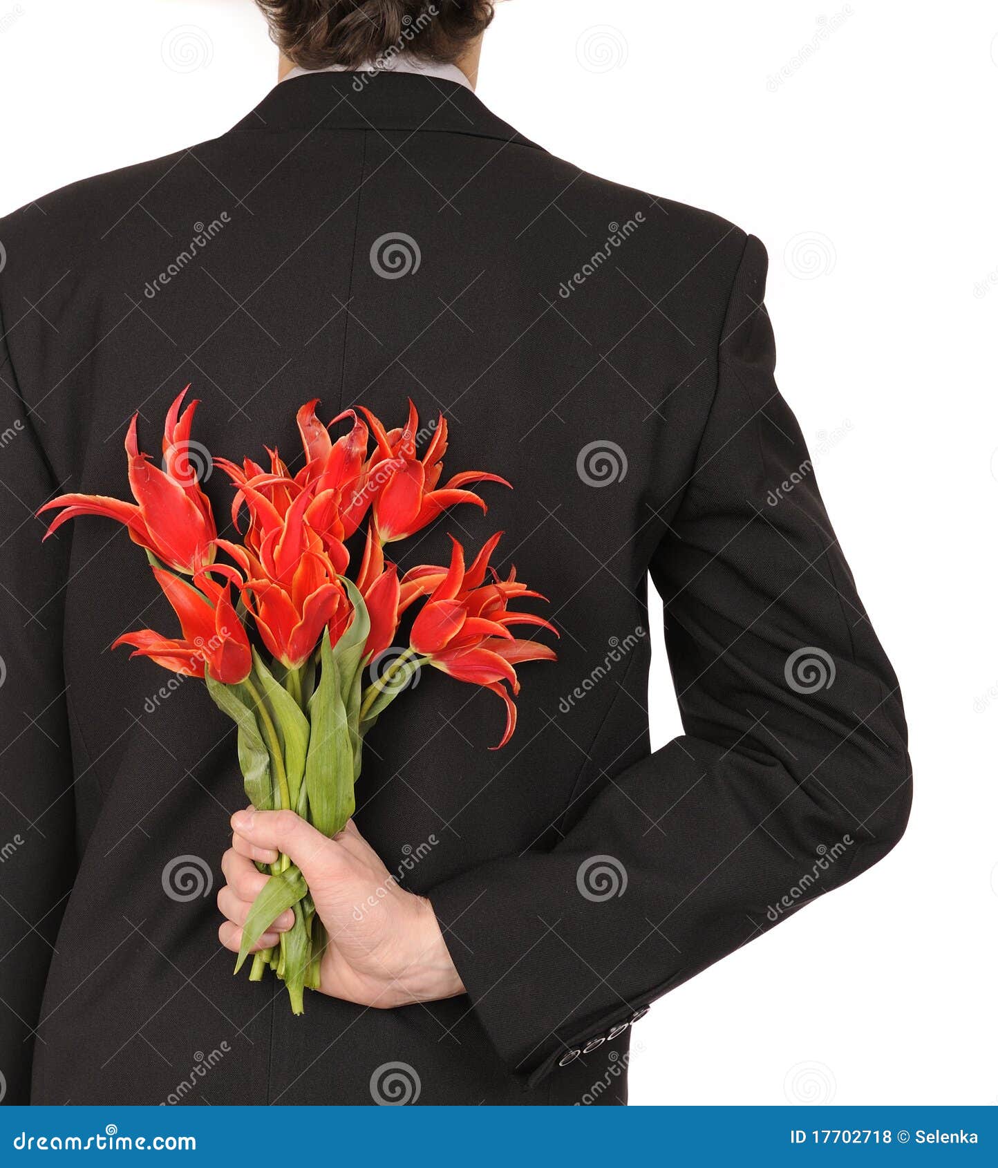 man holding flowers man holding flowers