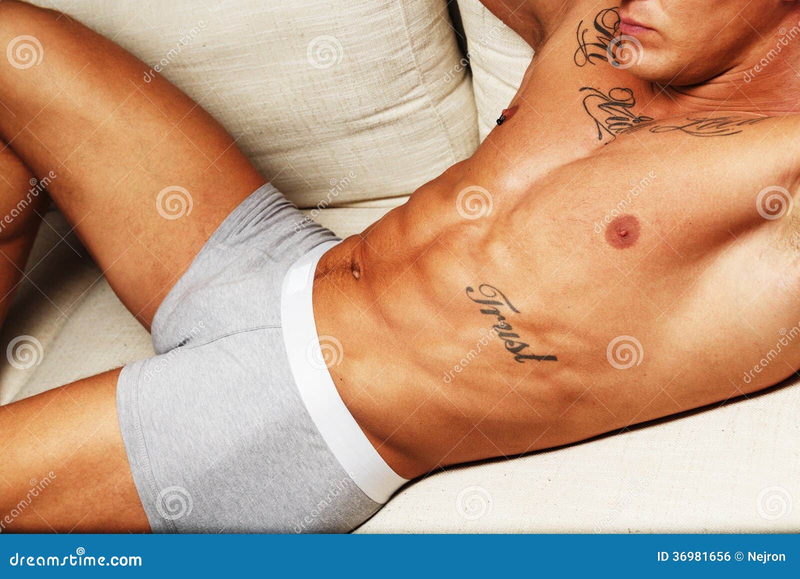 [Image: man-naked-muscular-torso-beautiful-tatto...981656.jpg]