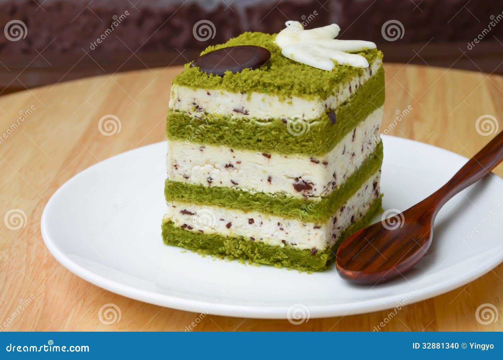 matcha-chocolate-chip-cake-wooden-table-32881340.jpg