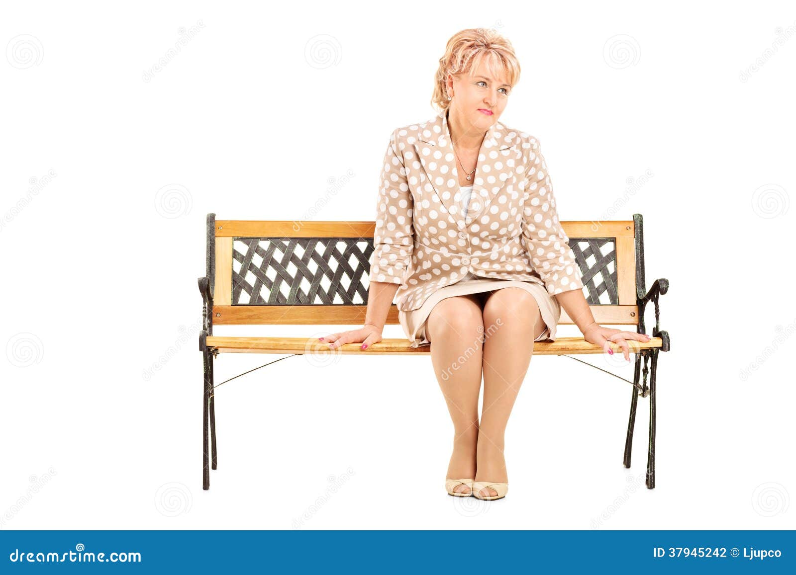 Mature Lady Sitting On A Bench Isolated On White Background Stock ...
