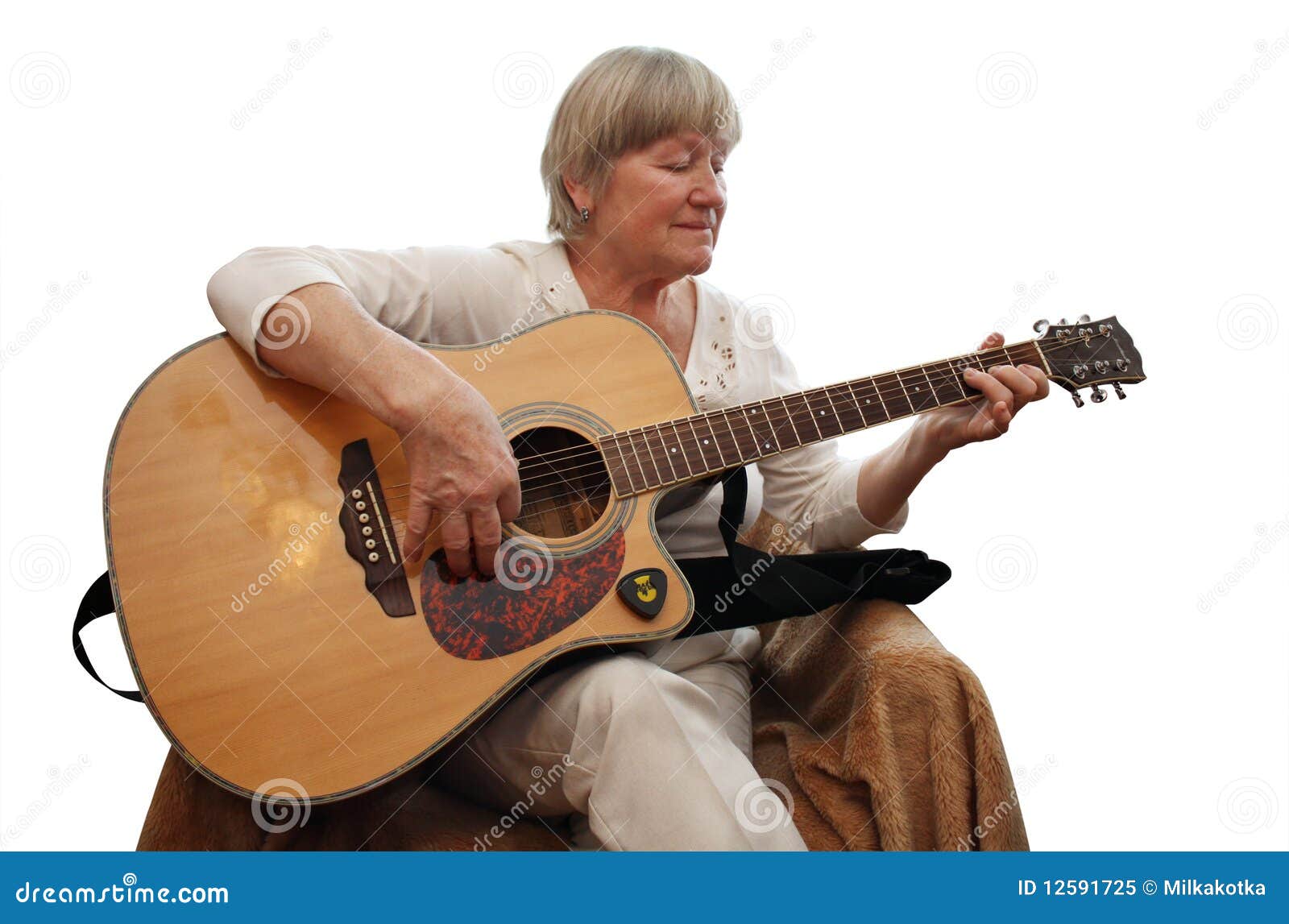 Royalty Free Stock Photo: Mature woman playing acoustic guitar