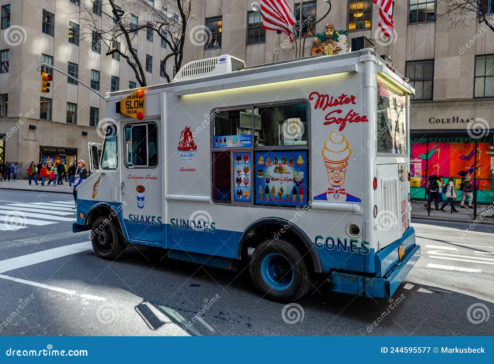 Mister Softee Ice Cream Truck Waiting At Red Traffic Light At Fifth