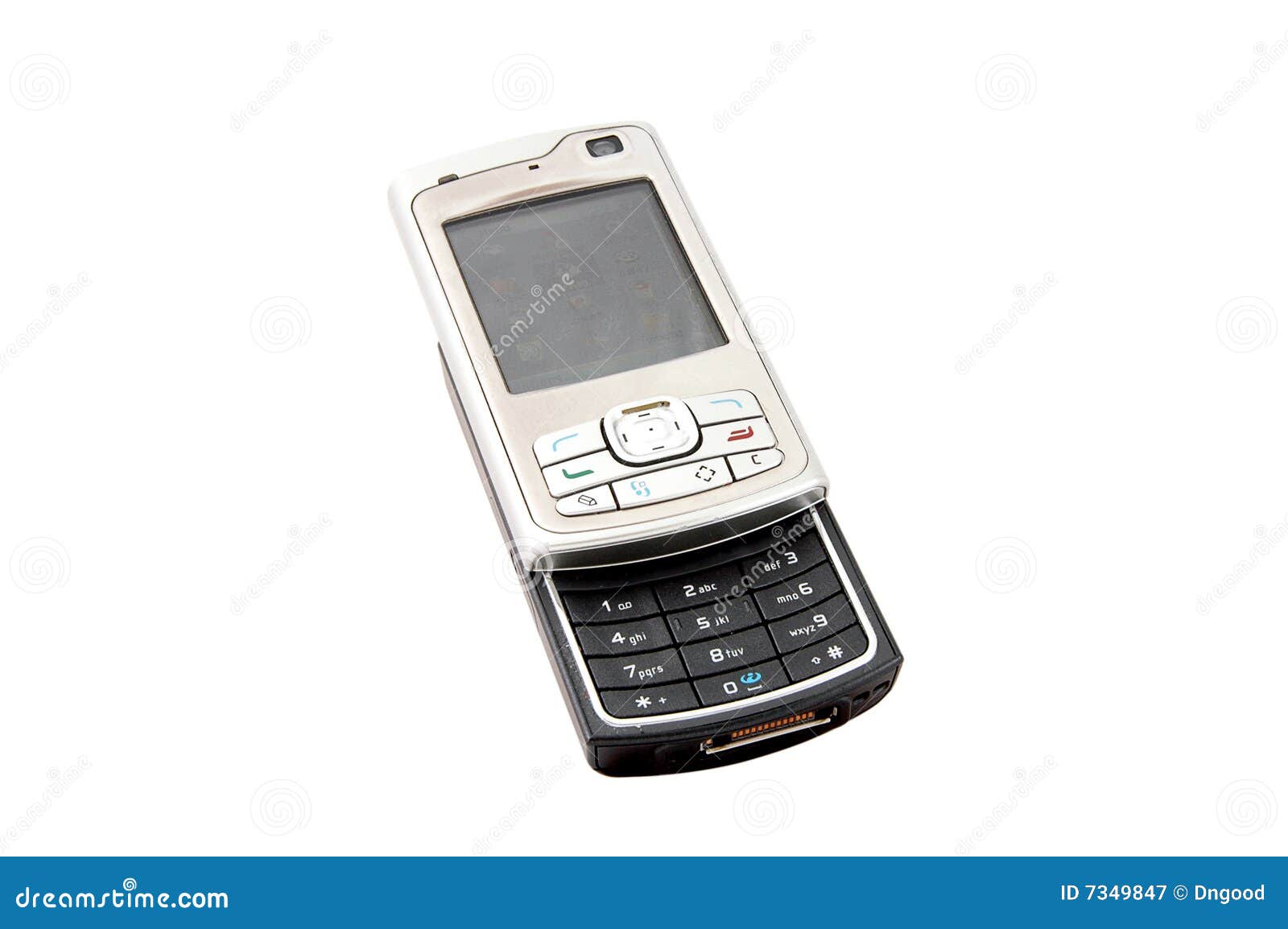 An isolated to white image of an old and used mobile phone.