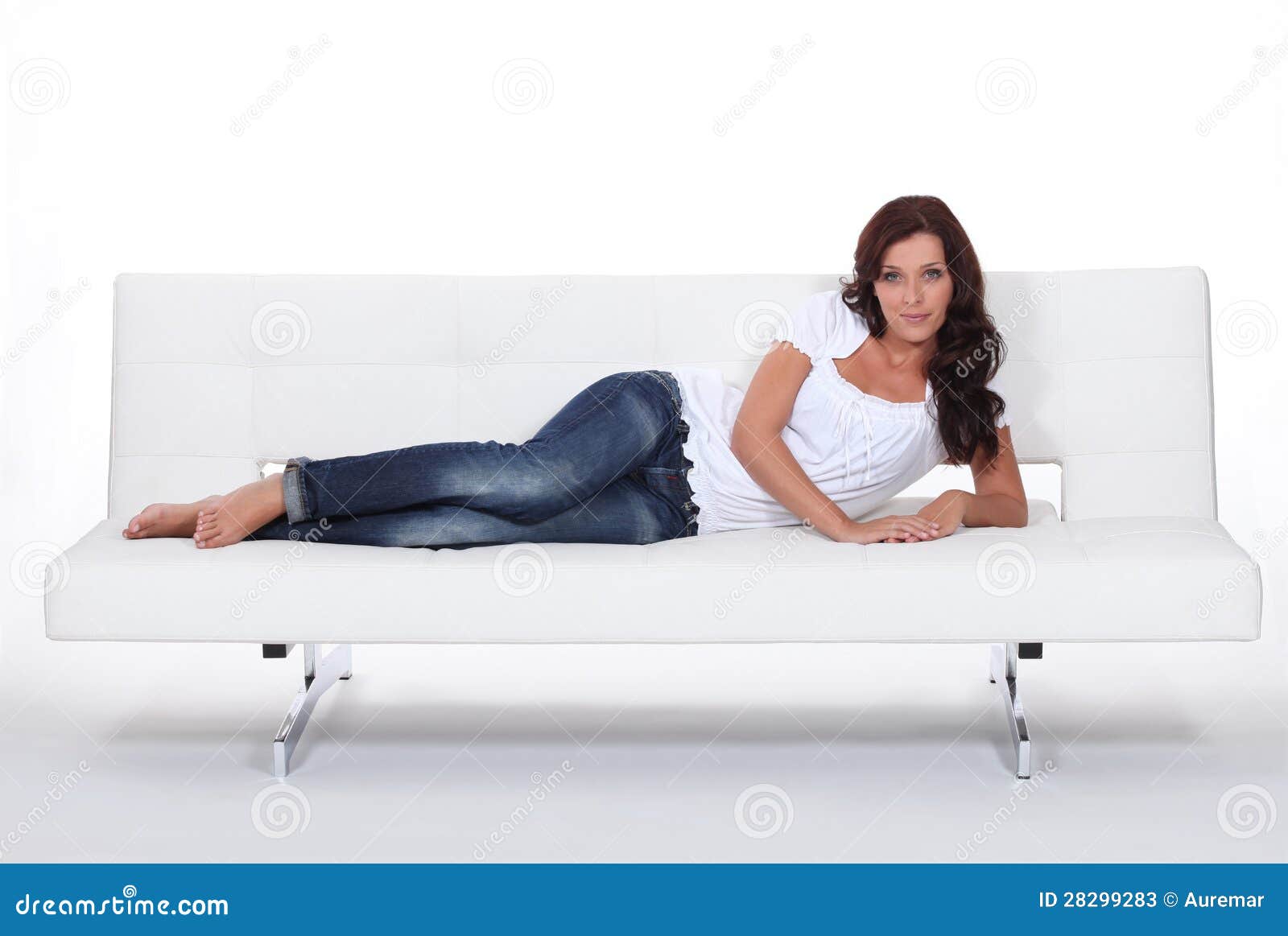 Model Laid On Expensive Sofa Stock Photos - Image: 28299283