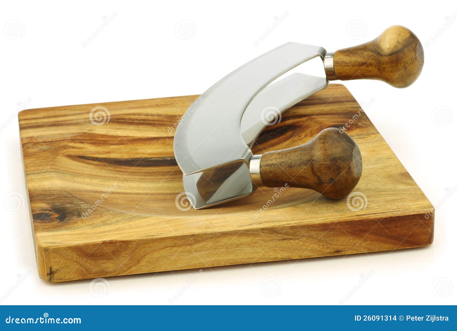  with wooden handles on a wooden cutting board on a white background