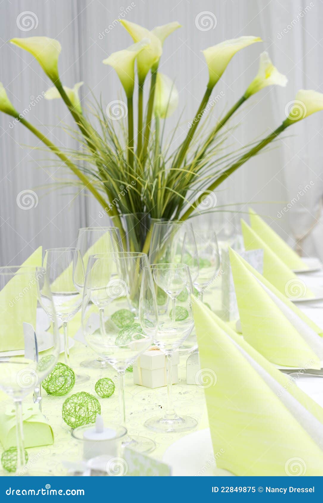 modern and festive decorated wedding table with yellow napkins and 