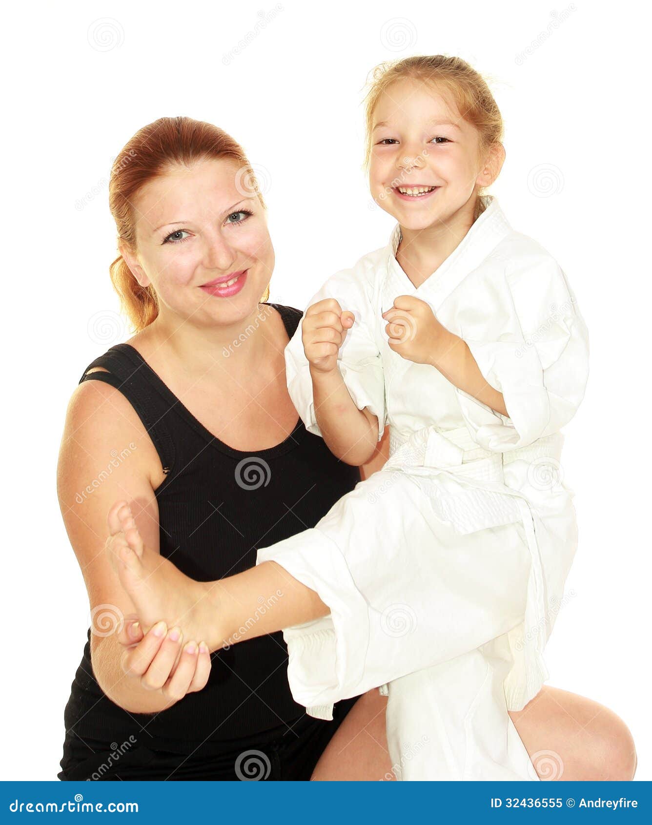 Mom Teaches Daughter Dressed In A Kimono Karate Kick