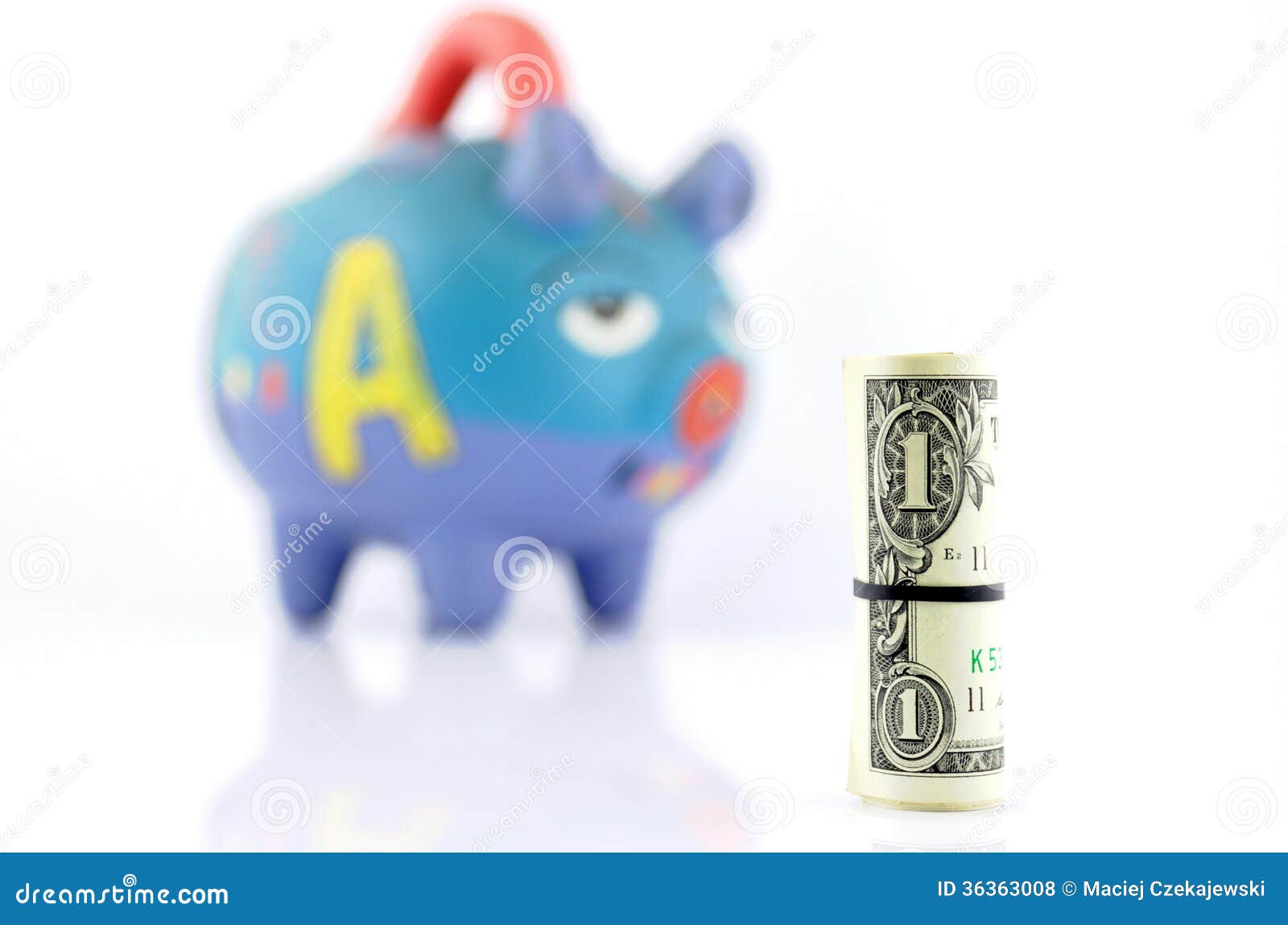 Money Saving In A Colorful Piggy Bank Royalty Free Stock Photos - Image ...