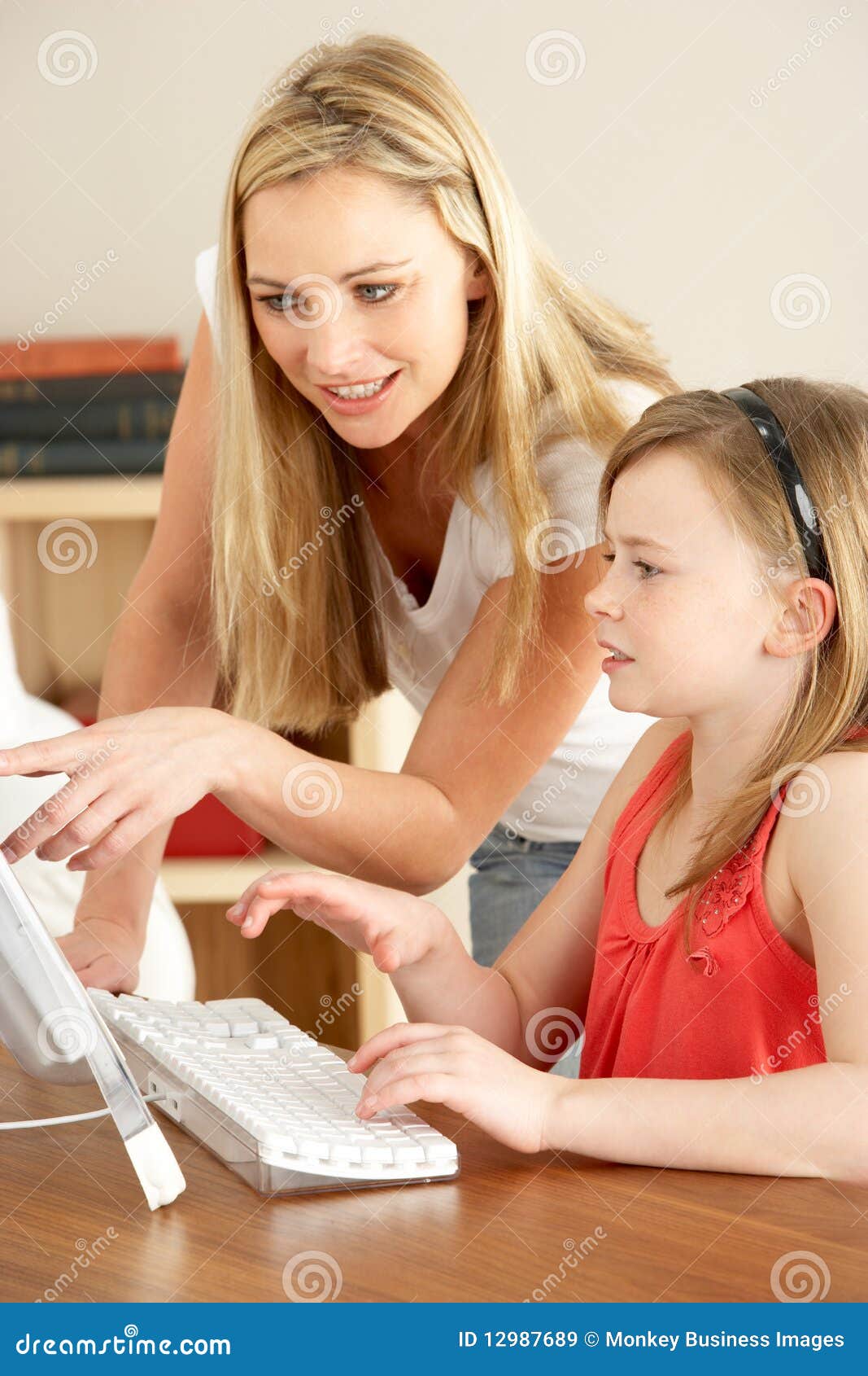 Mother And Daughter Using Computer Stock Photo - Image of 