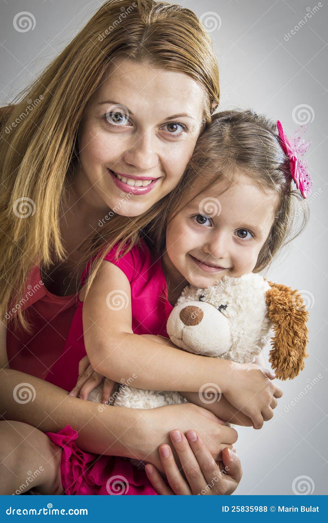 Young Mother Hugging Her Daughter Hoodoo Wallpaper 