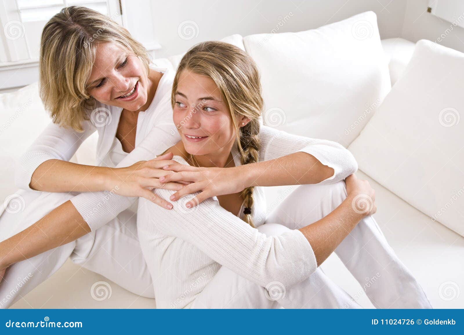 Mother And Teenage Daughter Talking At Home Royalty Free