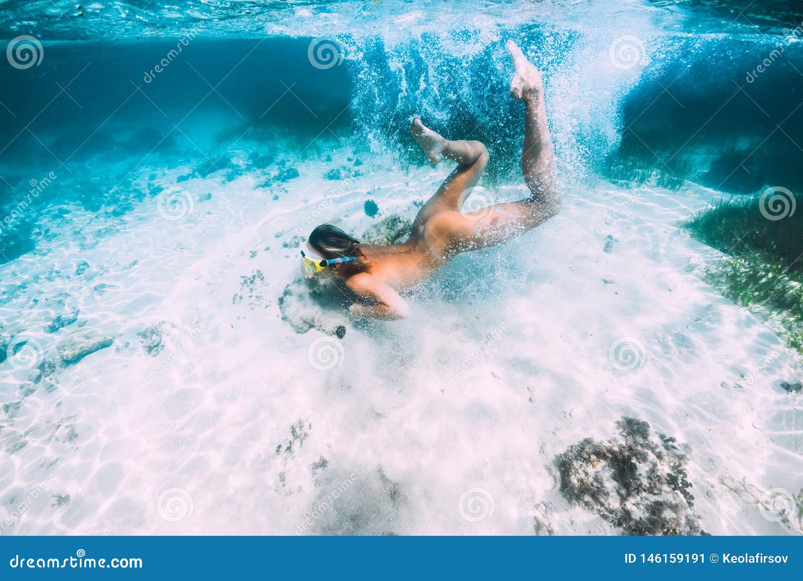 Naked Woman With Mask Swim And Dive In Tropical Ocean Stock Image