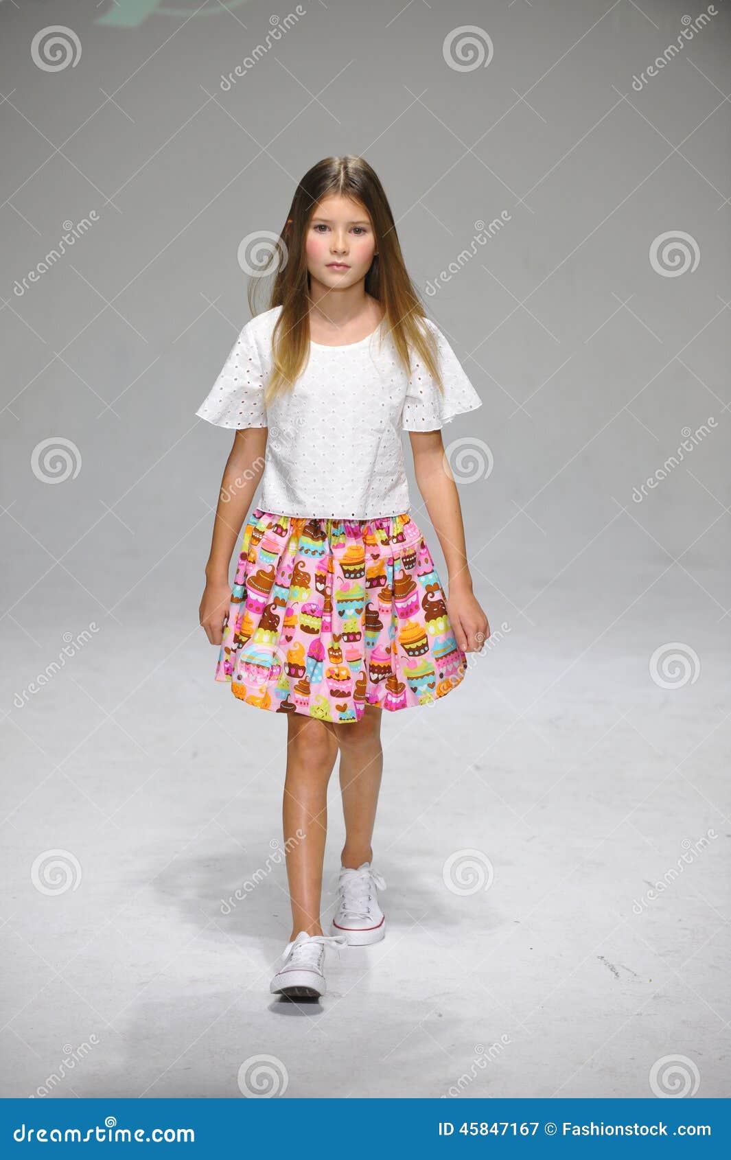 NEW YORK, NY - OCTOBER 19: A Model Walks The Runway During The Aria Children&#39;s Clothing Preview ...