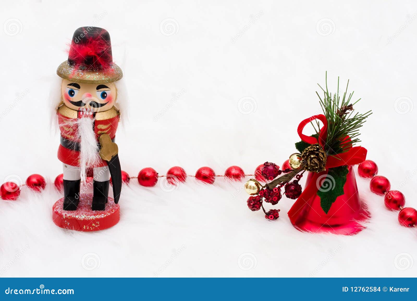 Nutcracker with bells on a white background.