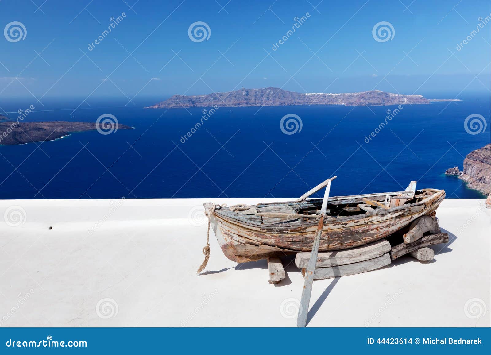 Old Boat On The Roof Of The Building On Santorini Island ...